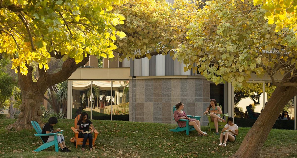 Students on the Mounds outside of Benson Auditorium.